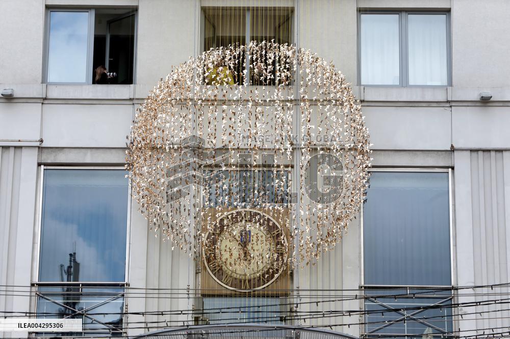 Art installation of 5,000 origami birds set up on facade of  Museum of Kyiv History
