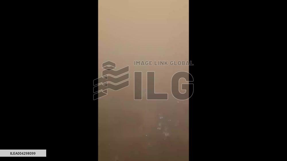 China: Yellow Haze Engulfs Xinjiang City During Sandstorm