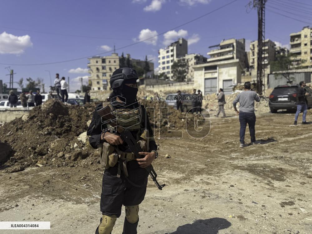 Bulldozer Clears Aleppo Road Under New Agreement