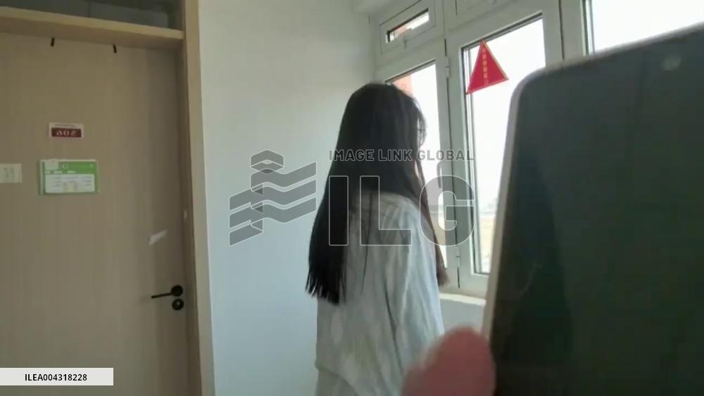 China: Hilarious Wind Blast Knocks Woman Back After Opening Window