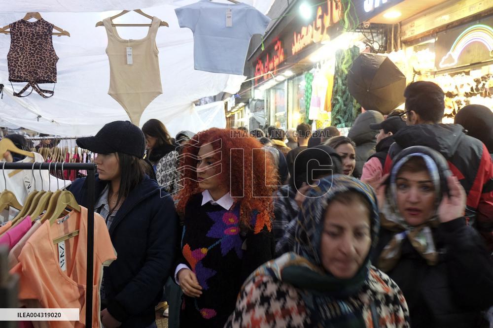 Iranian women defy the strict hijab laws in the street of Tehran