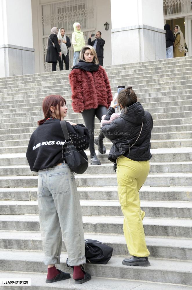Iranian women defy the strict hijab laws in the street of Tehran