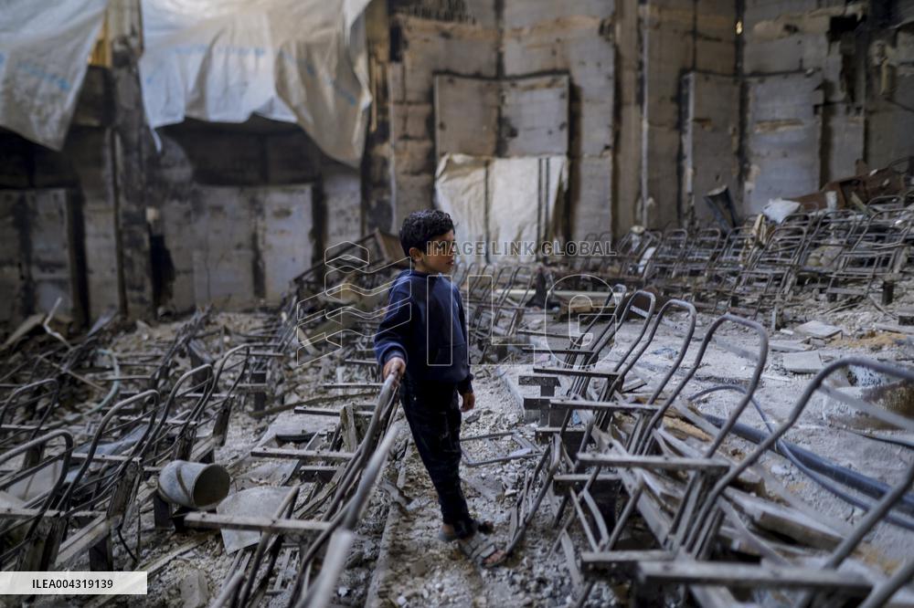 Displaced families live in the rubble of Islamic University - Gaza