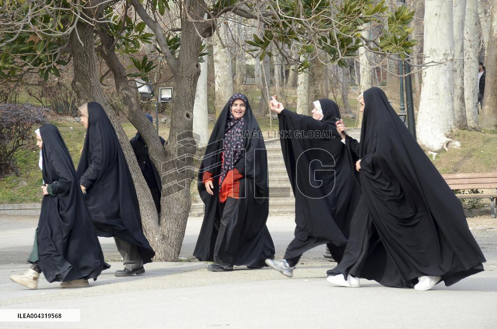 Iranian women defy the strict hijab laws in the street of Tehran
