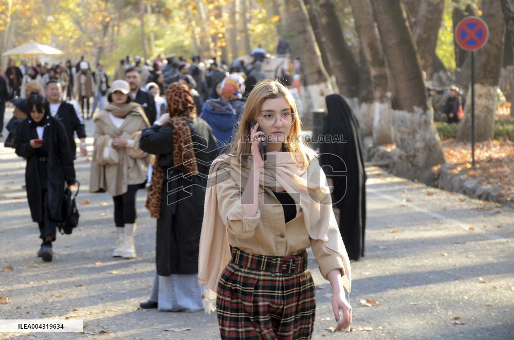 Iranian women defy the strict hijab laws in the street of Tehran