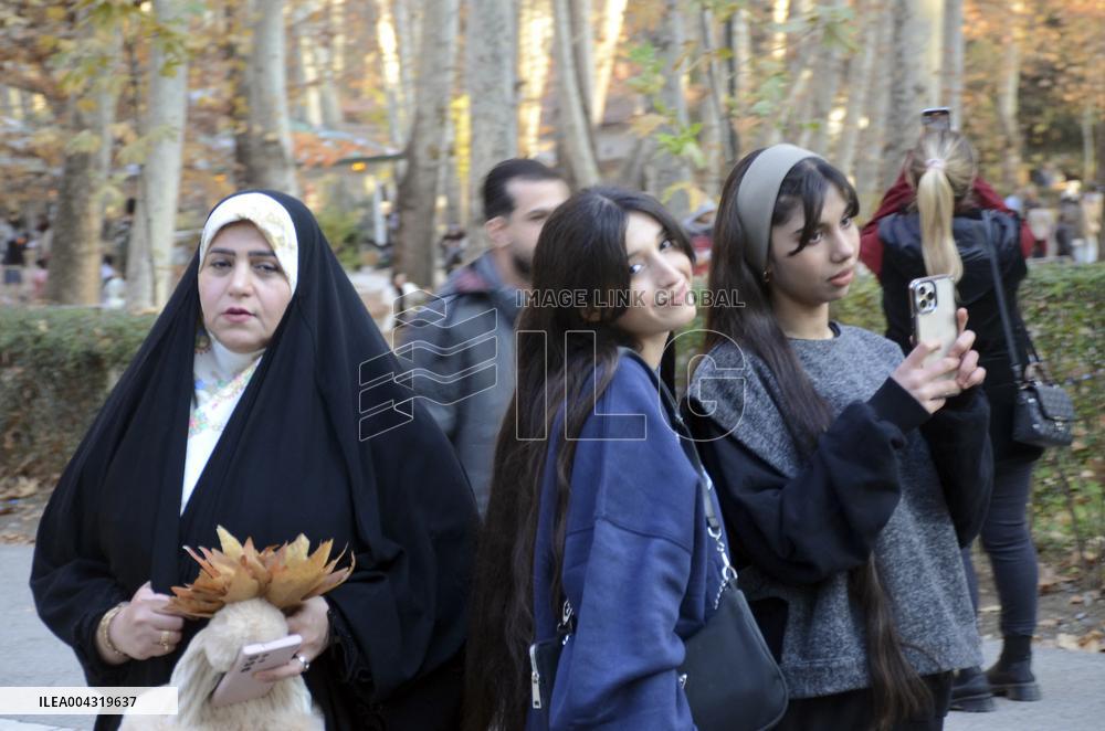 Iranian women defy the strict hijab laws in the street of Tehran