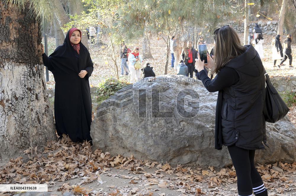 Iranian women defy the strict hijab laws in the street of Tehran