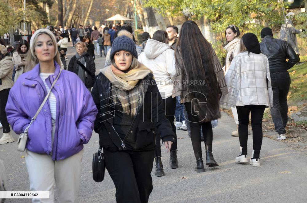Iranian women defy the strict hijab laws in the street of Tehran