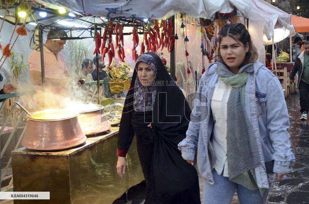 Iranian women defy the strict hijab laws in the street of Tehran