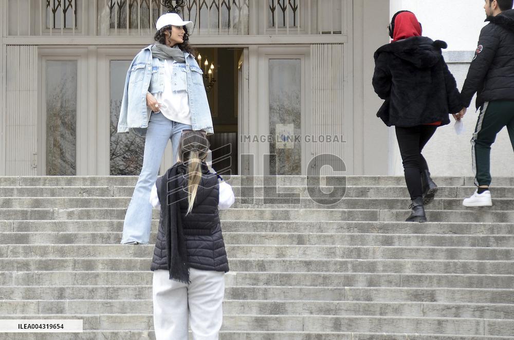 Iranian women defy the strict hijab laws in the street of Tehran