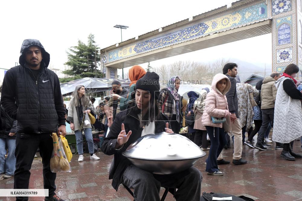 Iranian women defy the strict hijab laws in the street of Tehran