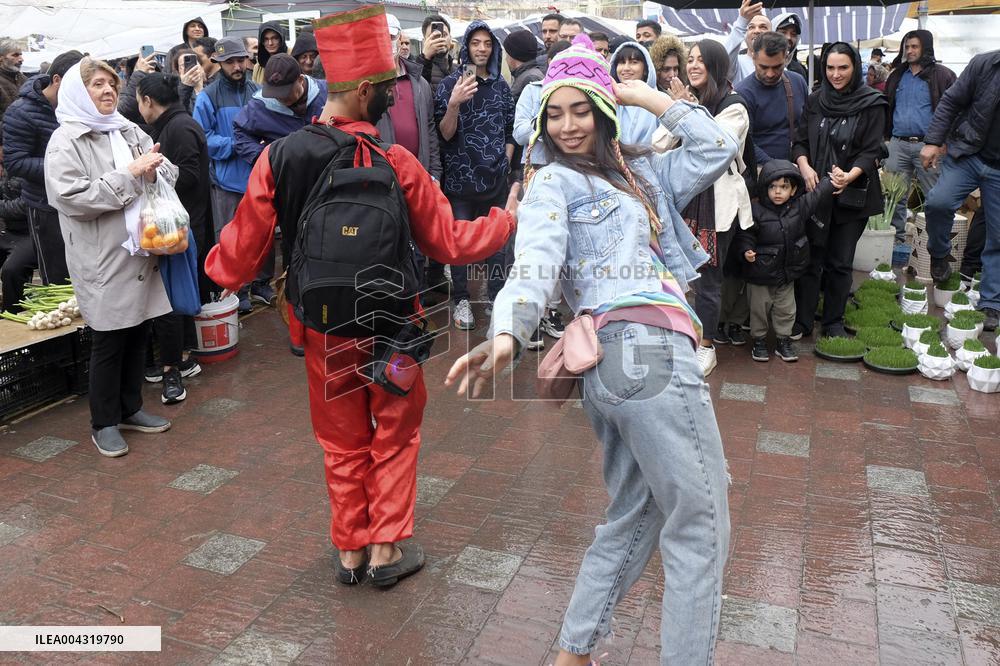 Iranian women defy the strict hijab laws in the street of Tehran