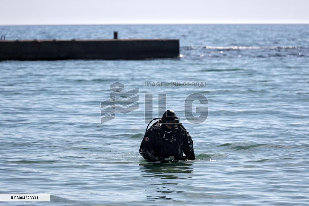Divers check Black Sea shore in Odesa before high season