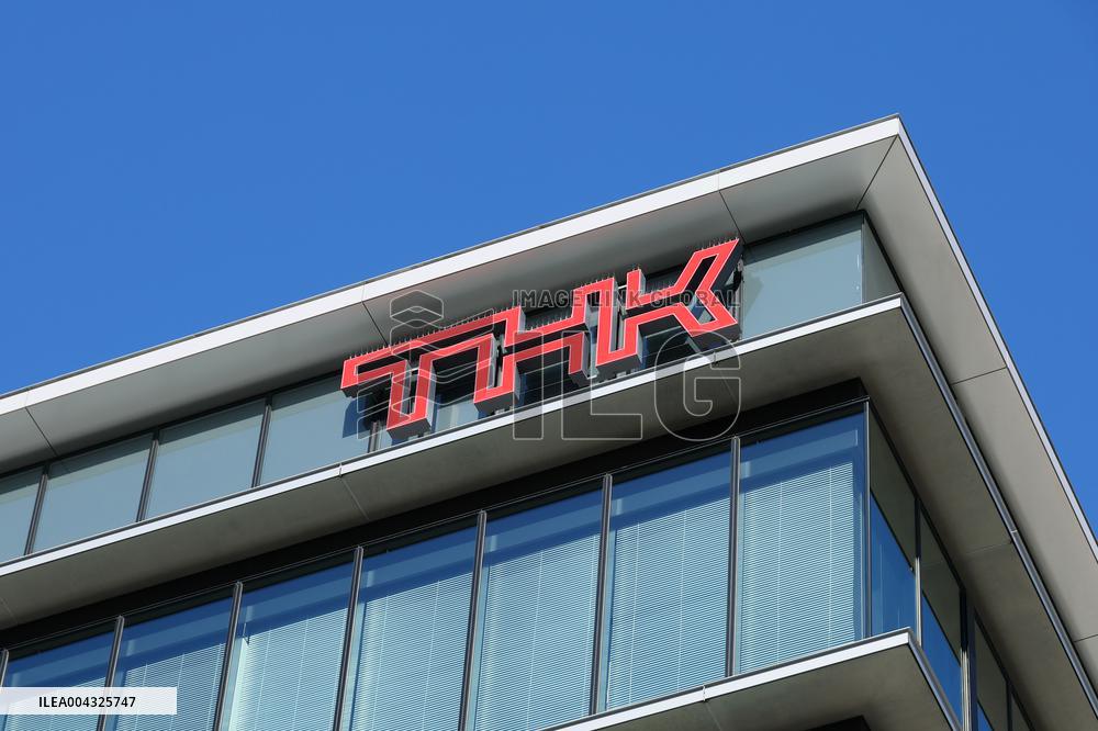 THK signage and logo