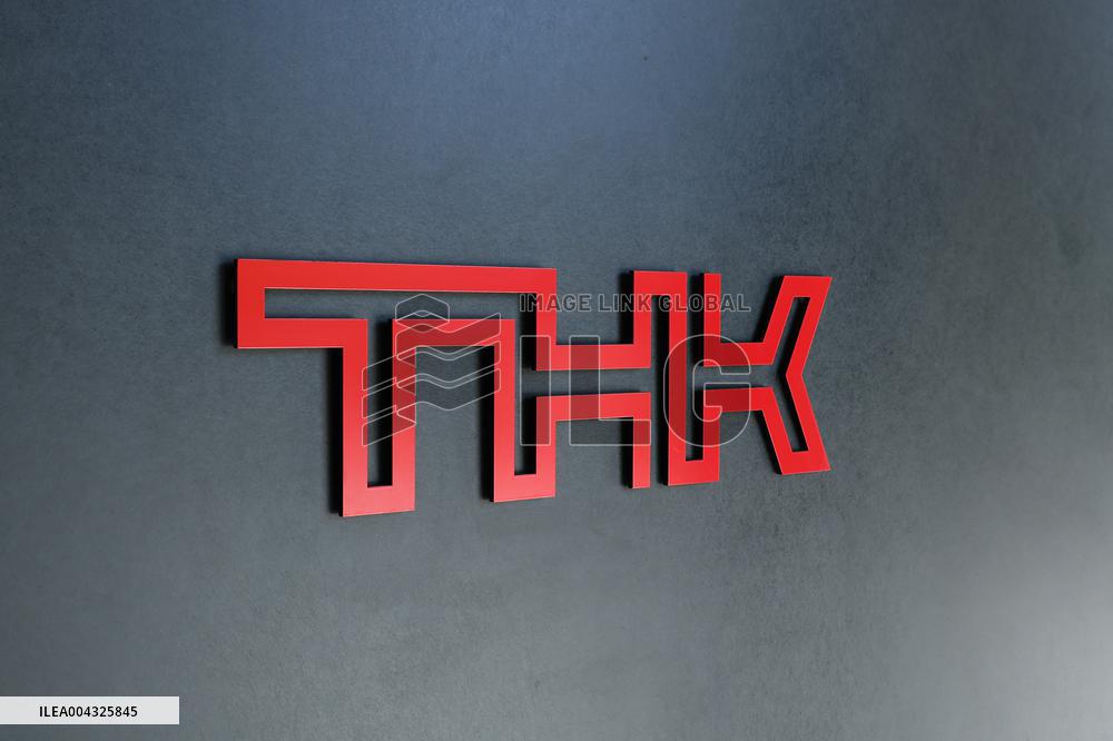 THK signage and logo