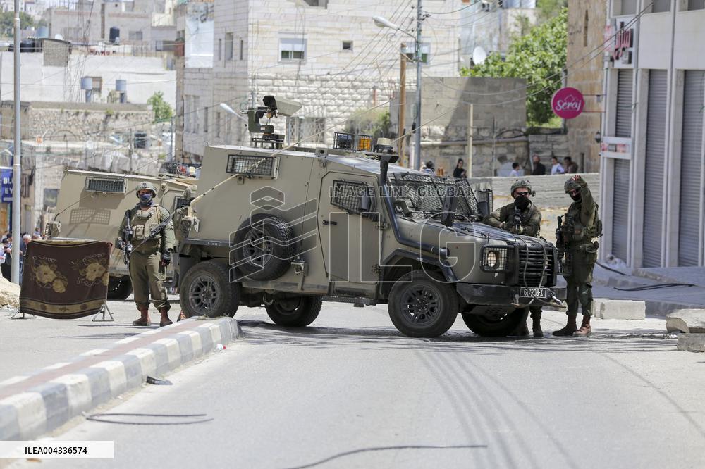 Israeli forces block the streets during Passover in Hebron