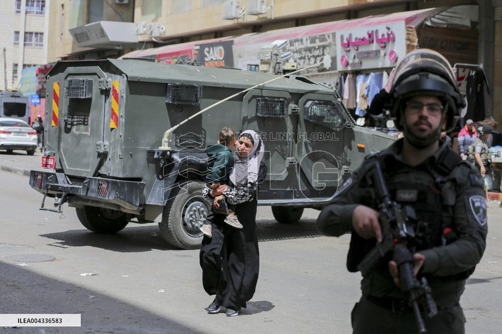 Israeli forces block the streets during Passover in Hebron