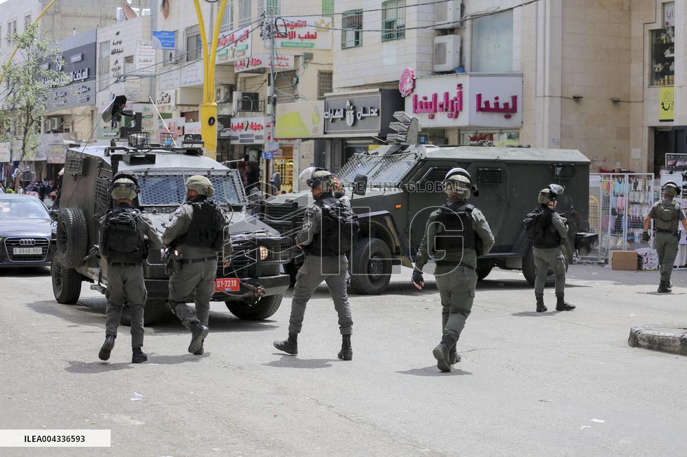 Israeli forces block the streets during Passover in Hebron