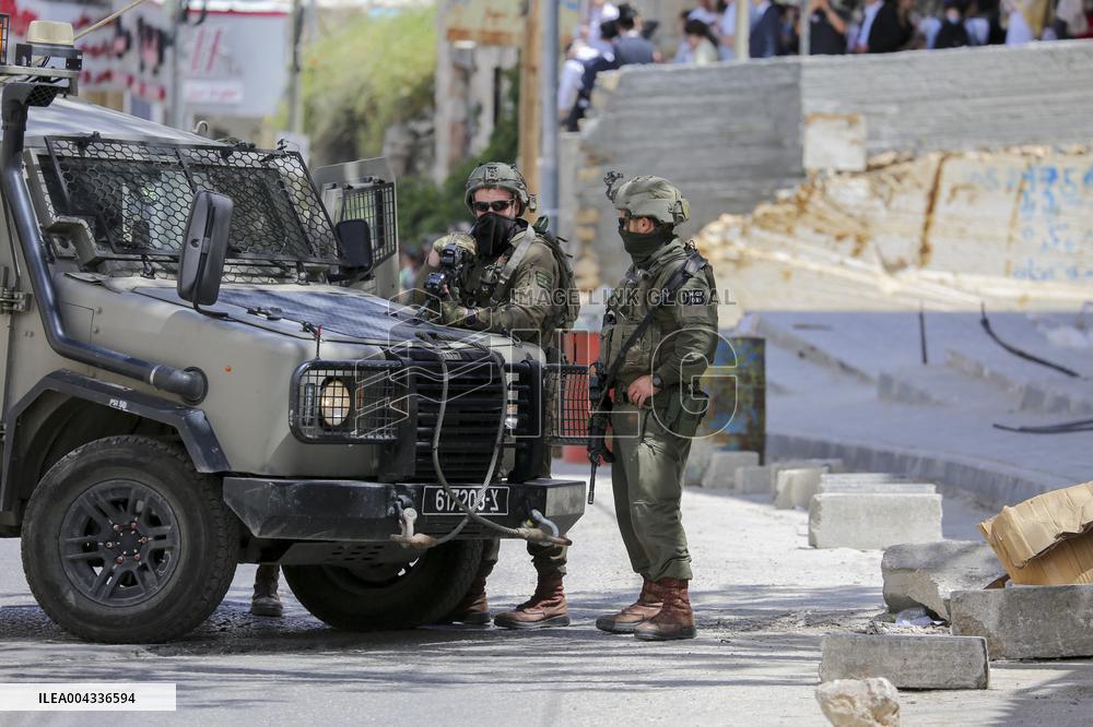 Israeli forces block the streets during Passover in Hebron