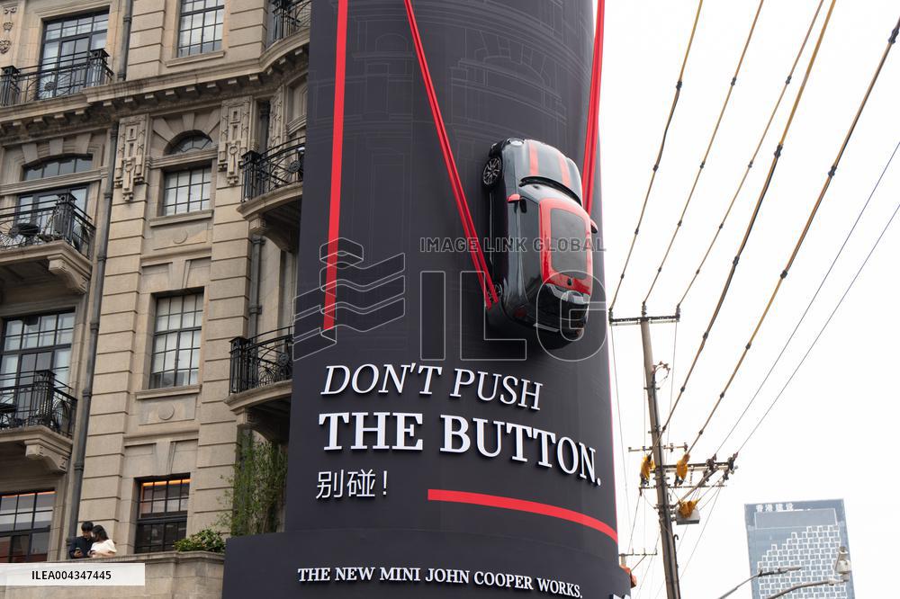 BMW MINI COOPER Car Parked On Building Wall in Shanghai
