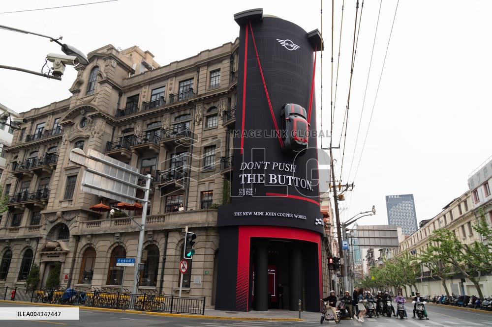 BMW MINI COOPER Car Parked On Building Wall in Shanghai