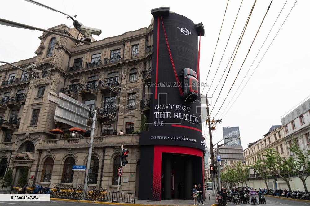 BMW MINI COOPER Car Parked On Building Wall in Shanghai
