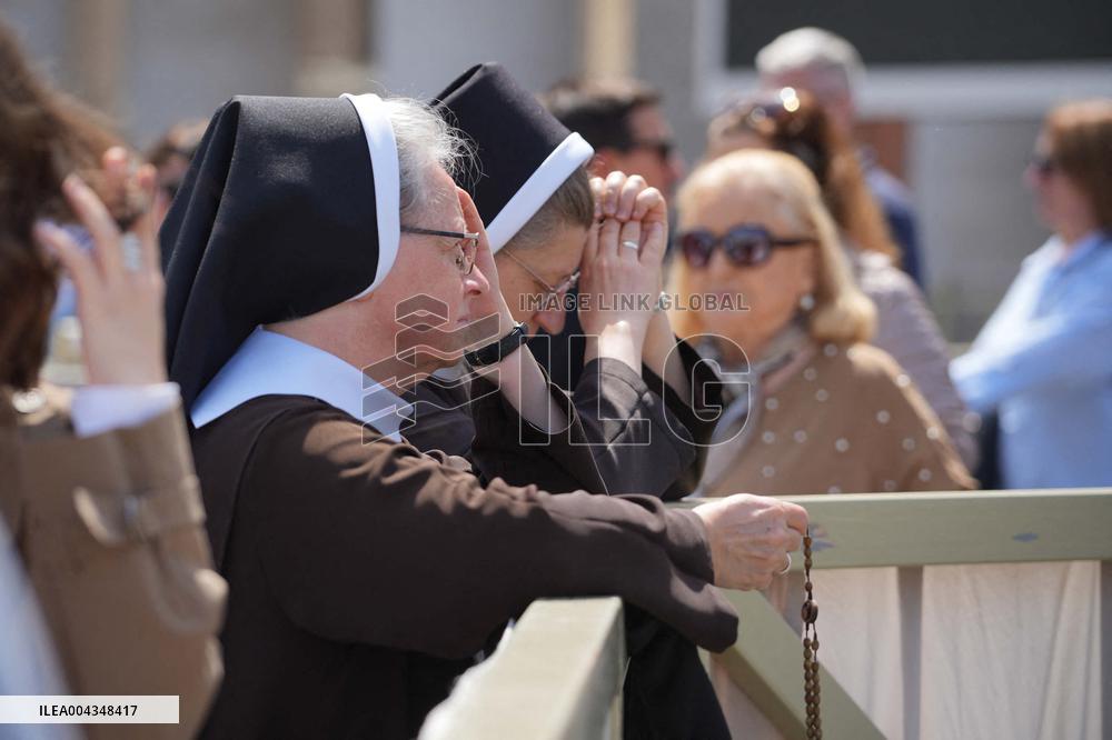 Faithful Gather in St Peters Square After the Death of Pope Francis - Vatican