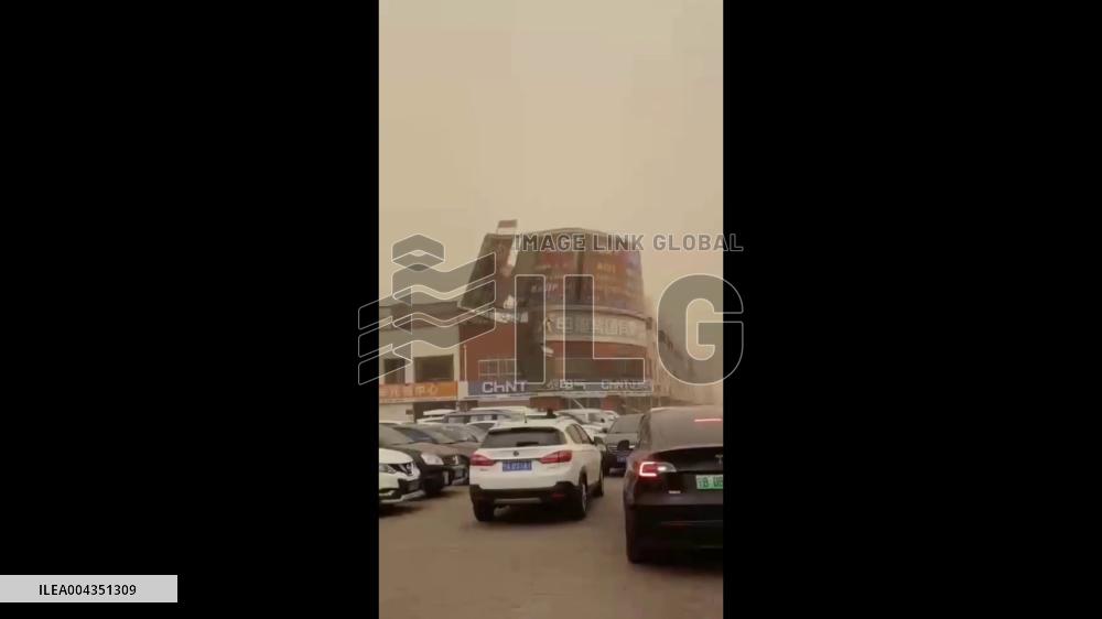 China: Billboard Blown Down by Gusty Wind Amid Sandstorm in Yinchuan