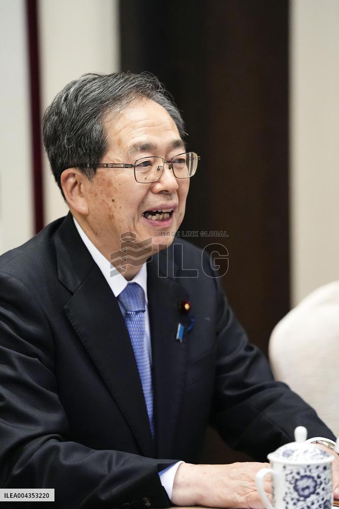 Komeito party chief in Beijing