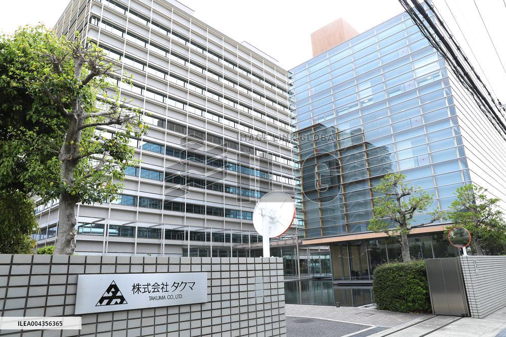 Takuma's exterior, signage and logo