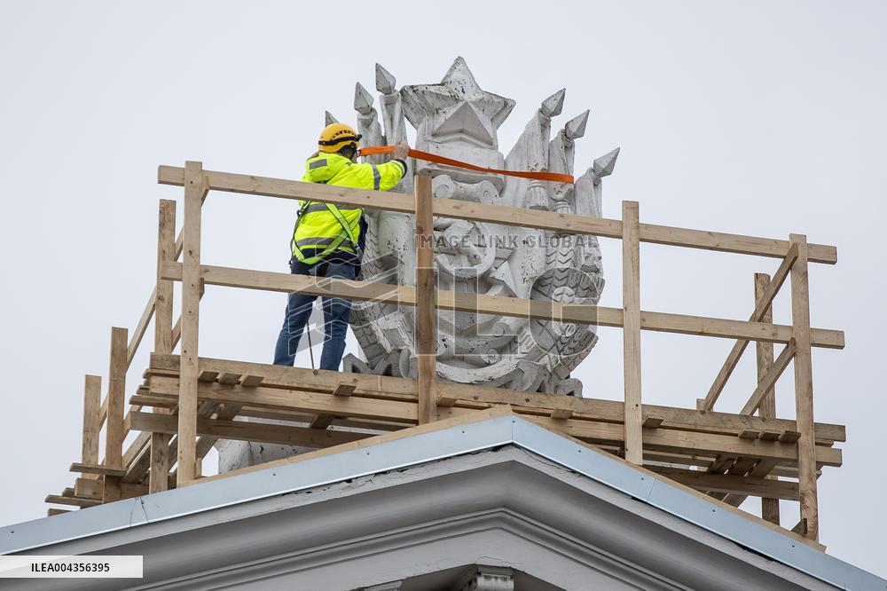 The removal of Soviet emblem from the Russian Cultural Center
