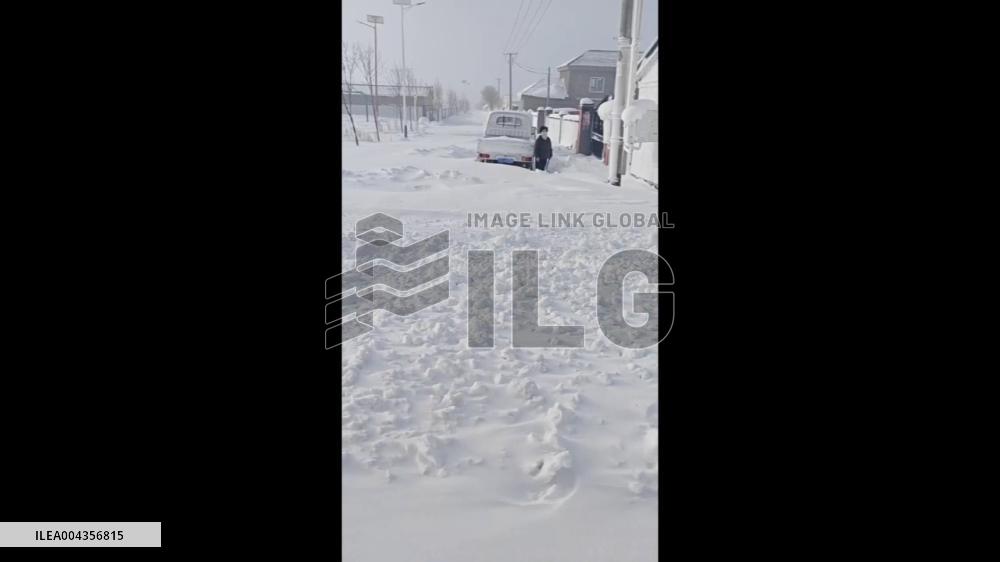 China: Xinjiang Hit by Spring Snowstorm, City Blanketed in White