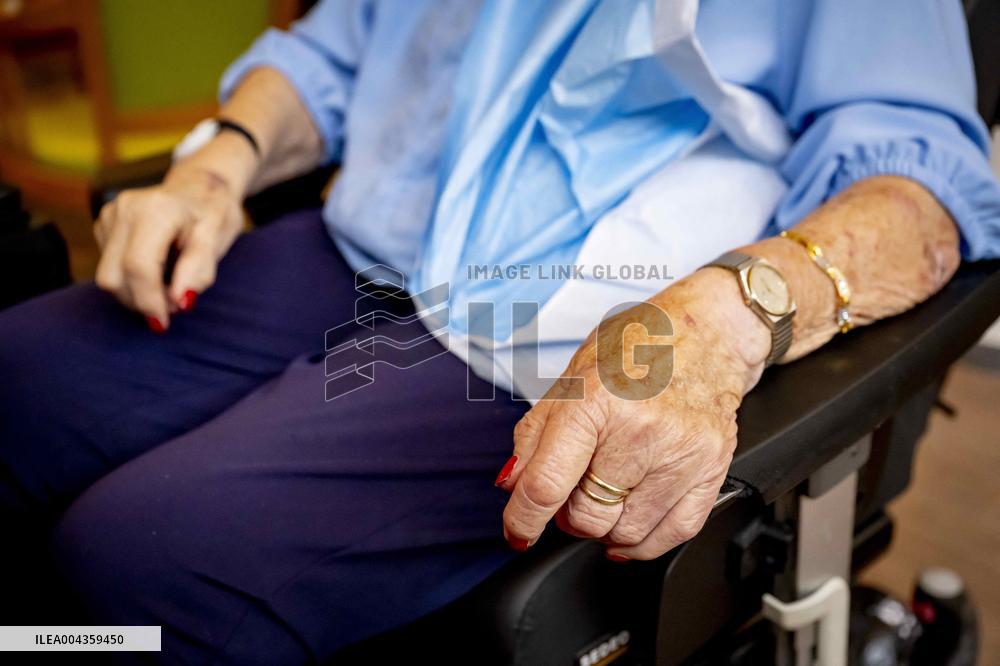 Elderly Woman In Wheelchair Illustrations - Netherlands