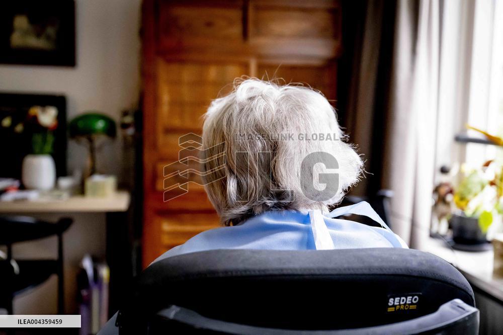 Elderly Woman In Wheelchair Illustrations - Netherlands