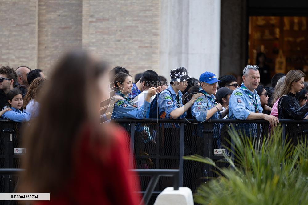 People queue at St Peter Basilica to pay their respects to late Pope Francis - Rome
