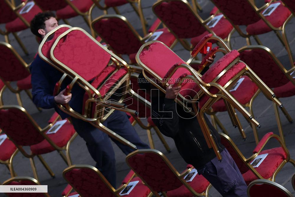 The faithful and priests wait on the steps of St Peter s Basilica for the Funeral of Pope Francis