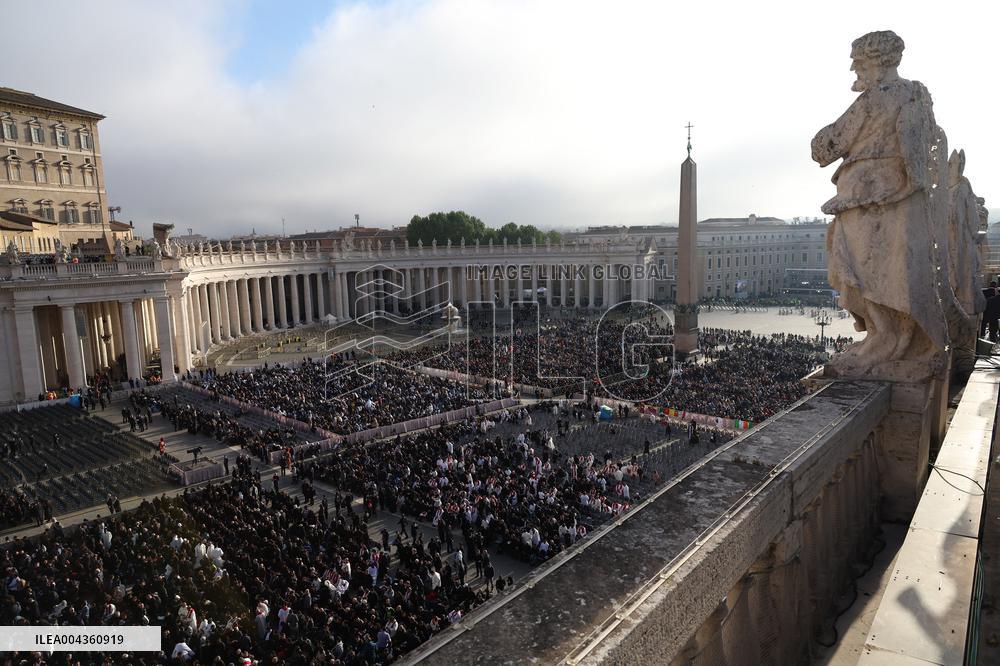 The faithful and priests wait on the steps of St Peter s Basilica for the Funeral of Pope Francis