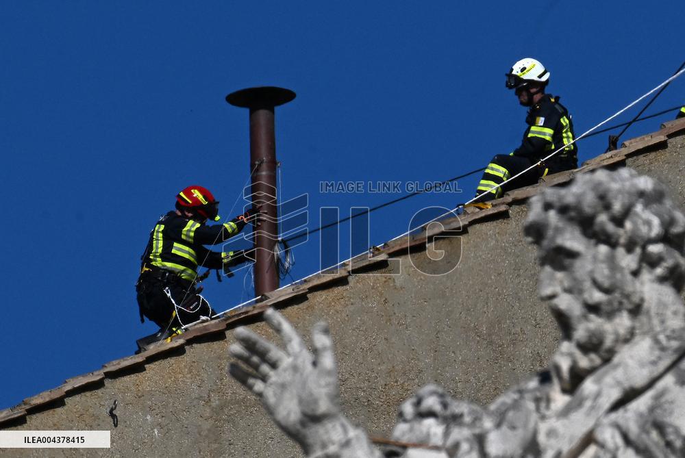 Firefighters Install Chimney On The Sistine Chapel For Papal Election - Vatican