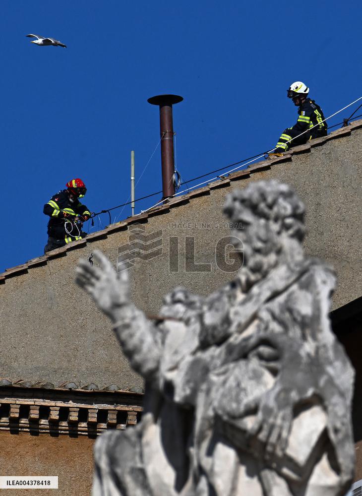 Firefighters Install Chimney On The Sistine Chapel For Papal Election - Vatican
