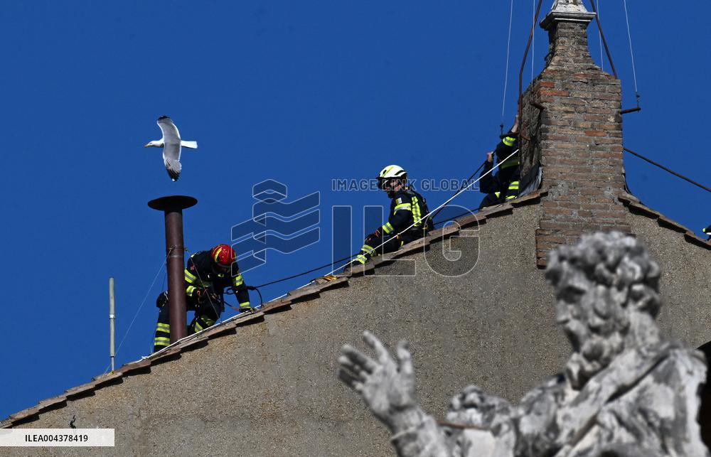 Firefighters Install Chimney On The Sistine Chapel For Papal Election - Vatican
