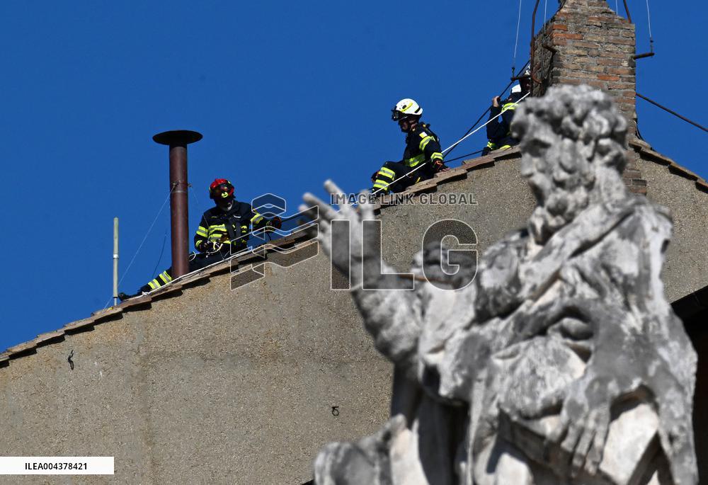 Firefighters Install Chimney On The Sistine Chapel For Papal Election - Vatican