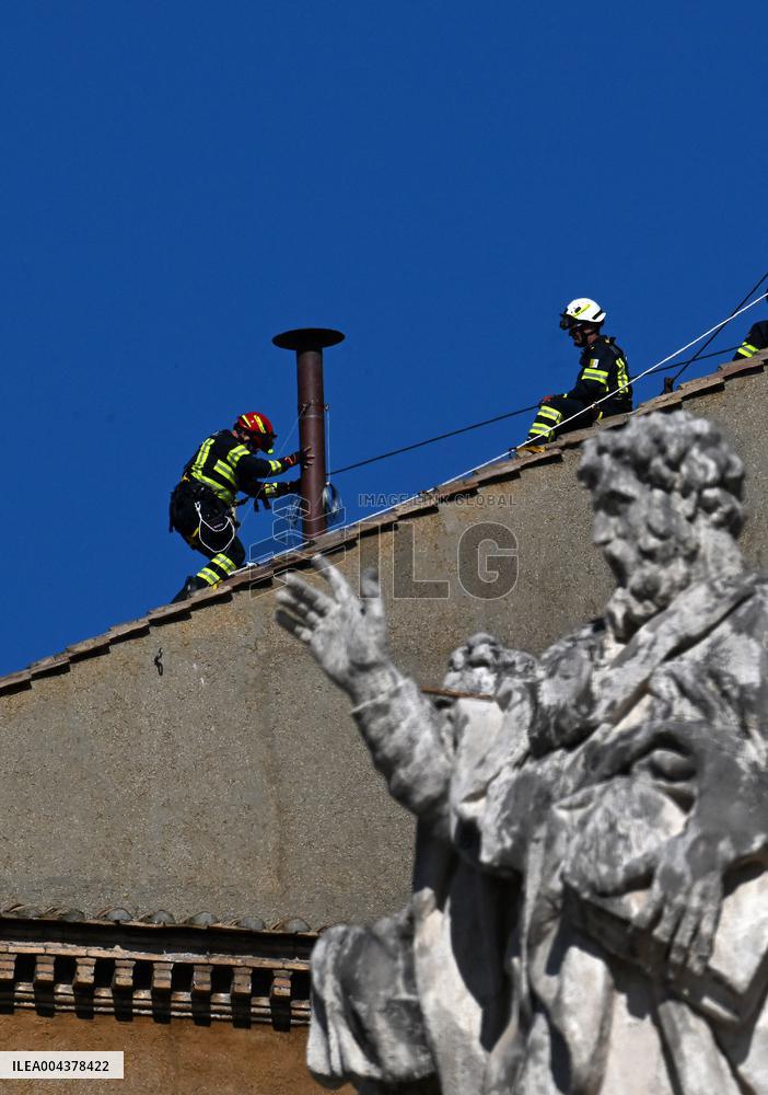 Firefighters Install Chimney On The Sistine Chapel For Papal Election - Vatican