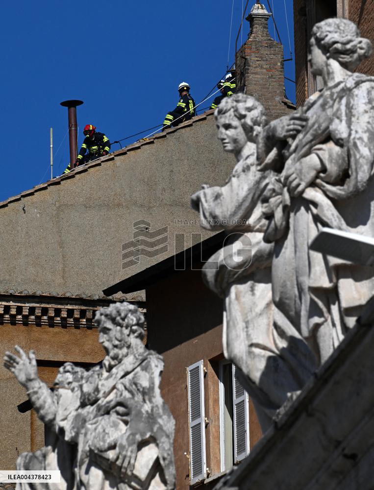 Firefighters Install Chimney On The Sistine Chapel For Papal Election - Vatican