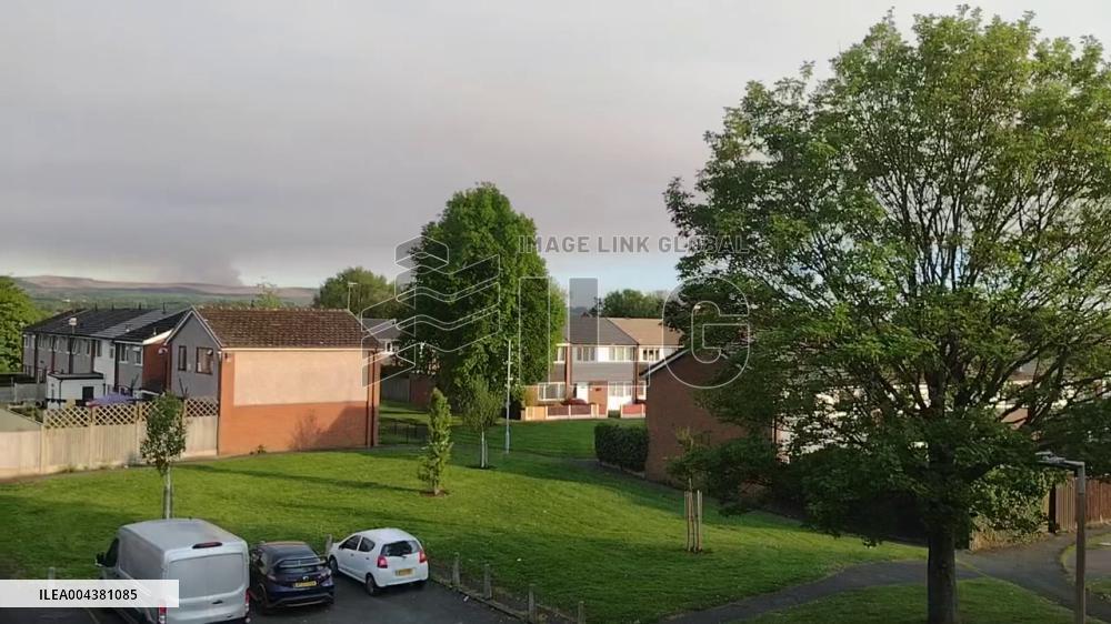 UK: Smoke of Peak District Wildfire Seen From Greater Manchester