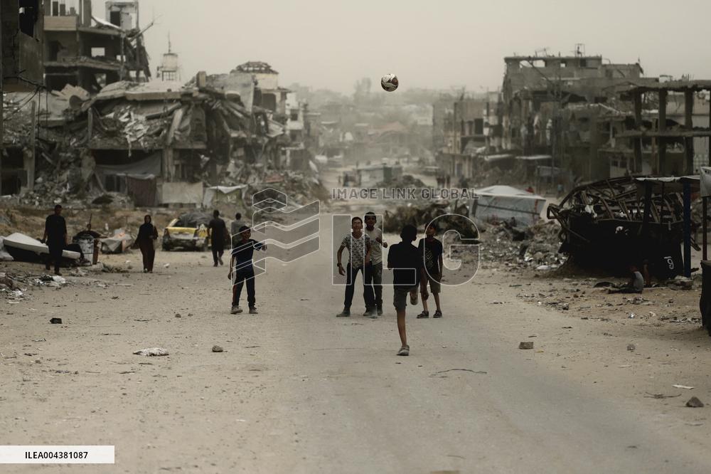 Children Play Soccer in Destroyed Buildings - Gaza