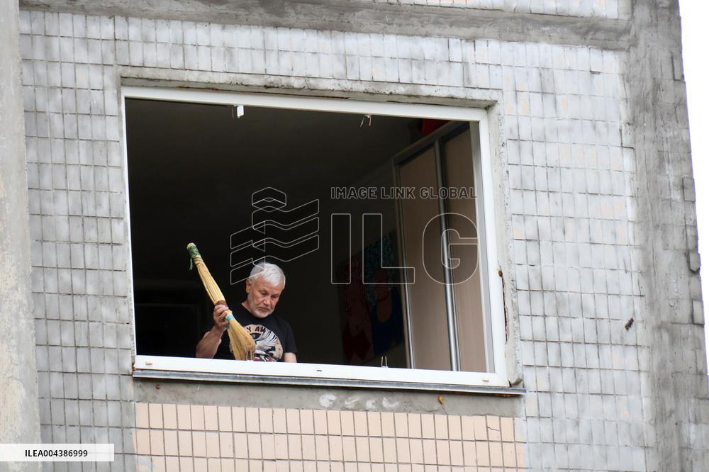 Shopping center, supermarket and residential building damaged by shelling in Kyiv