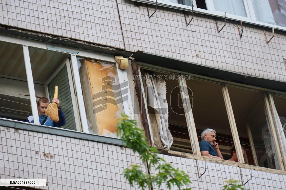 Shopping center, supermarket and residential building damaged by shelling in Kyiv