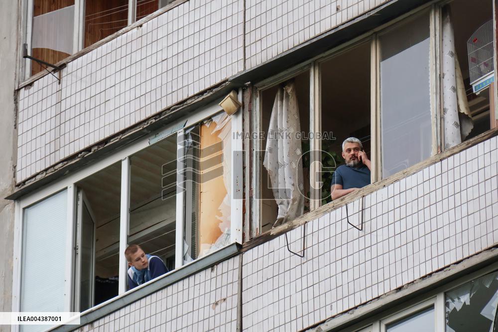 Shopping center, supermarket and residential building damaged by shelling in Kyiv