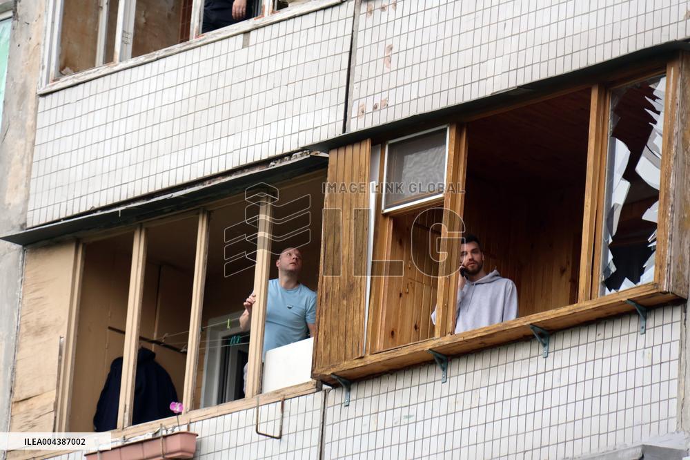 Shopping center, supermarket and residential building damaged by shelling in Kyiv