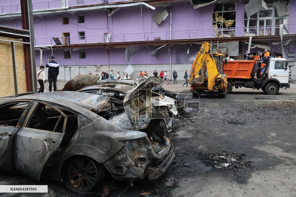 Shopping center, supermarket and residential building damaged by shelling in Kyiv